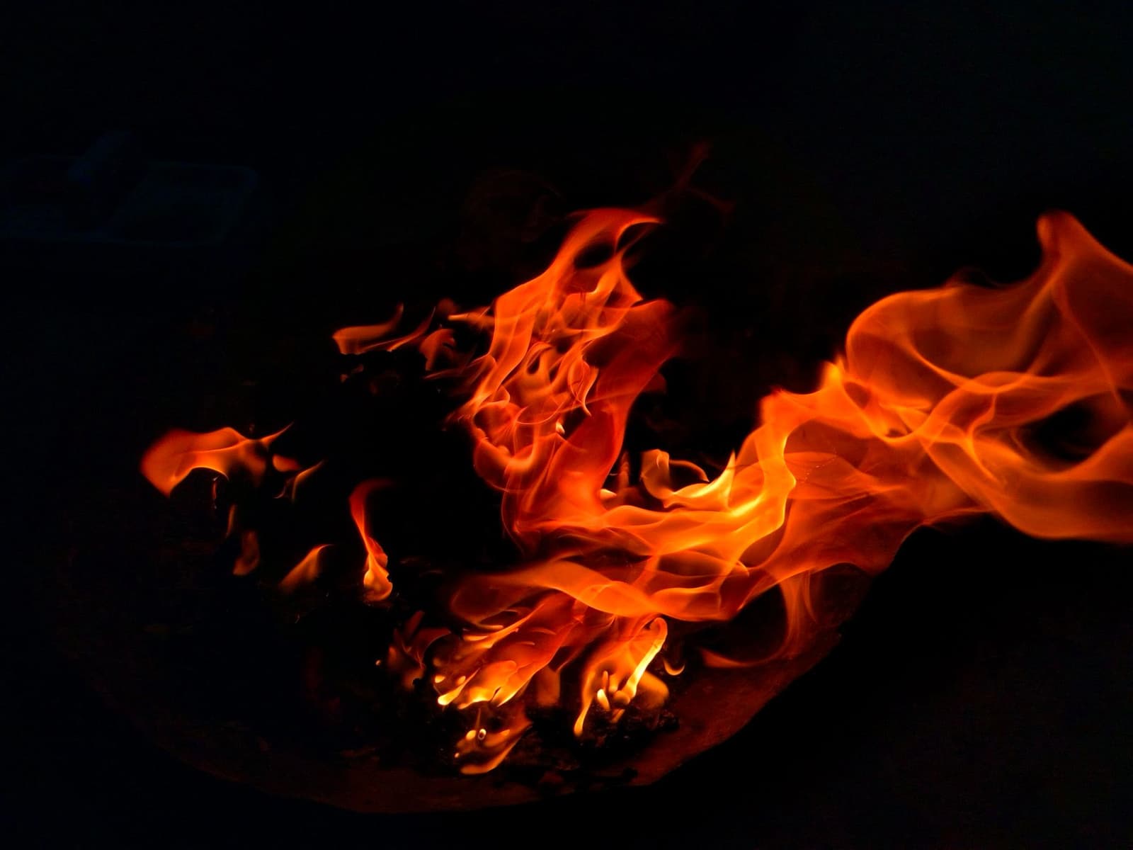 Orange flames against a black background, under the headline Antimony