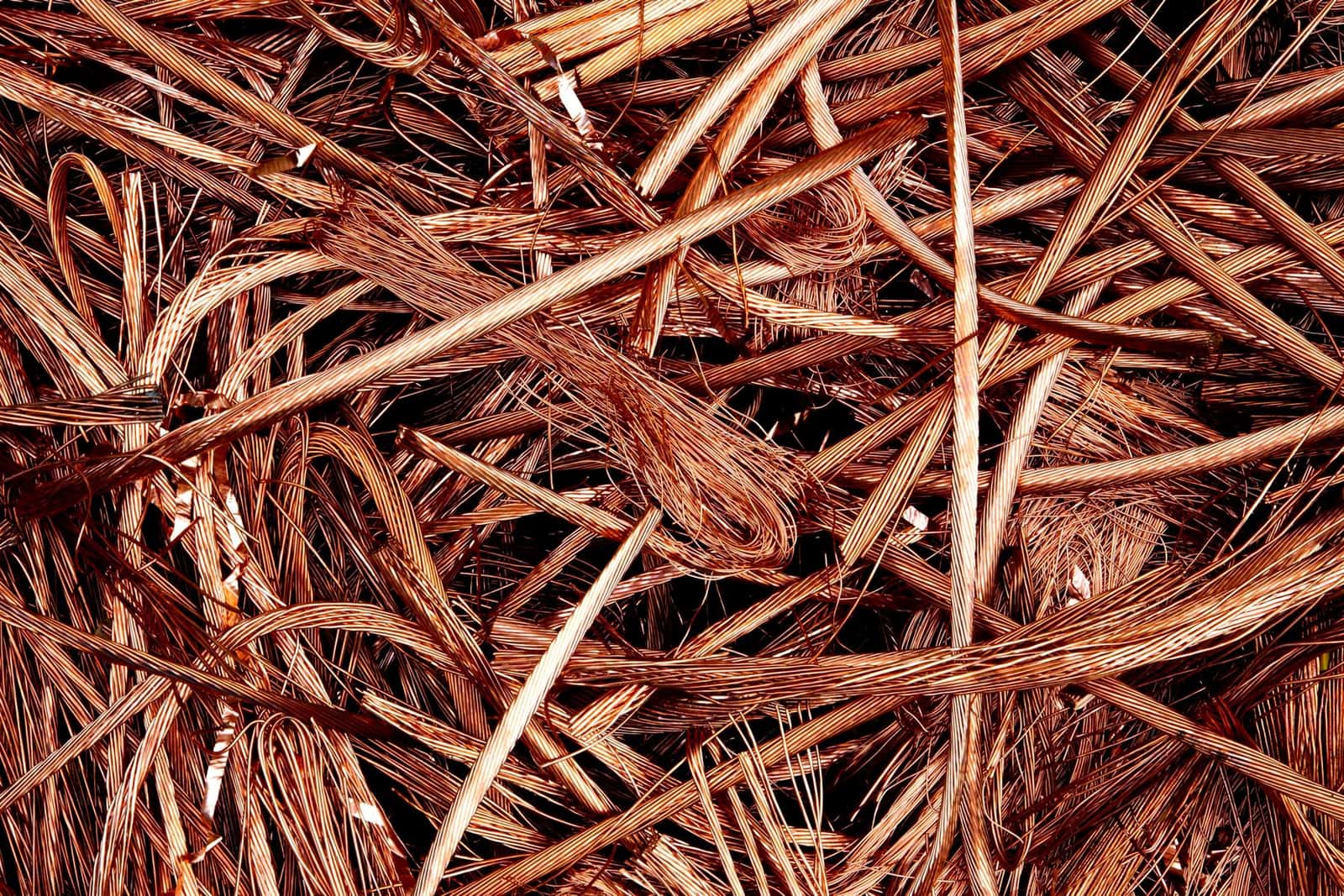A tangle of bare copper wire, under the headline Copper